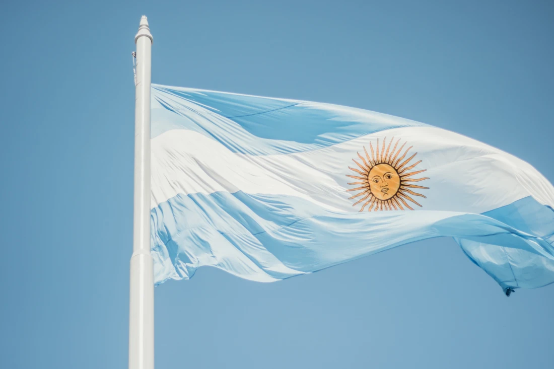 Blue-white flag of Argentina with the sun in the middle