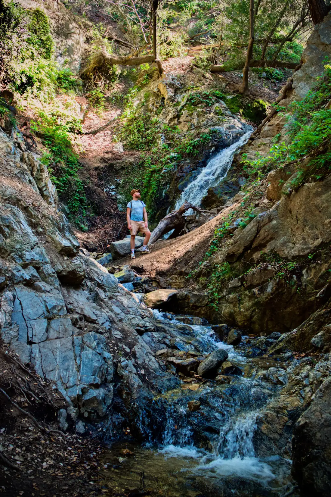 Daan proudly posing at the of the Waterfall Trail at Placerita Canyon © Coupleofmen.com