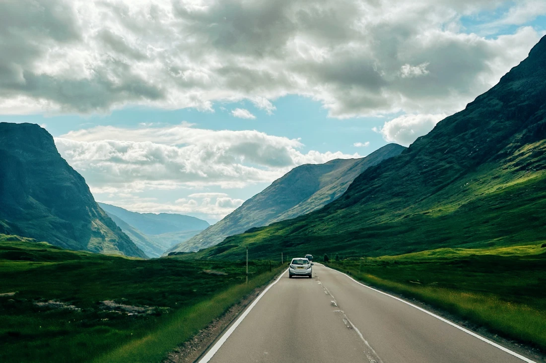 Road Trip Scottish Highlands On the (left) road with a camper in Scotland © Coupleofmen.com