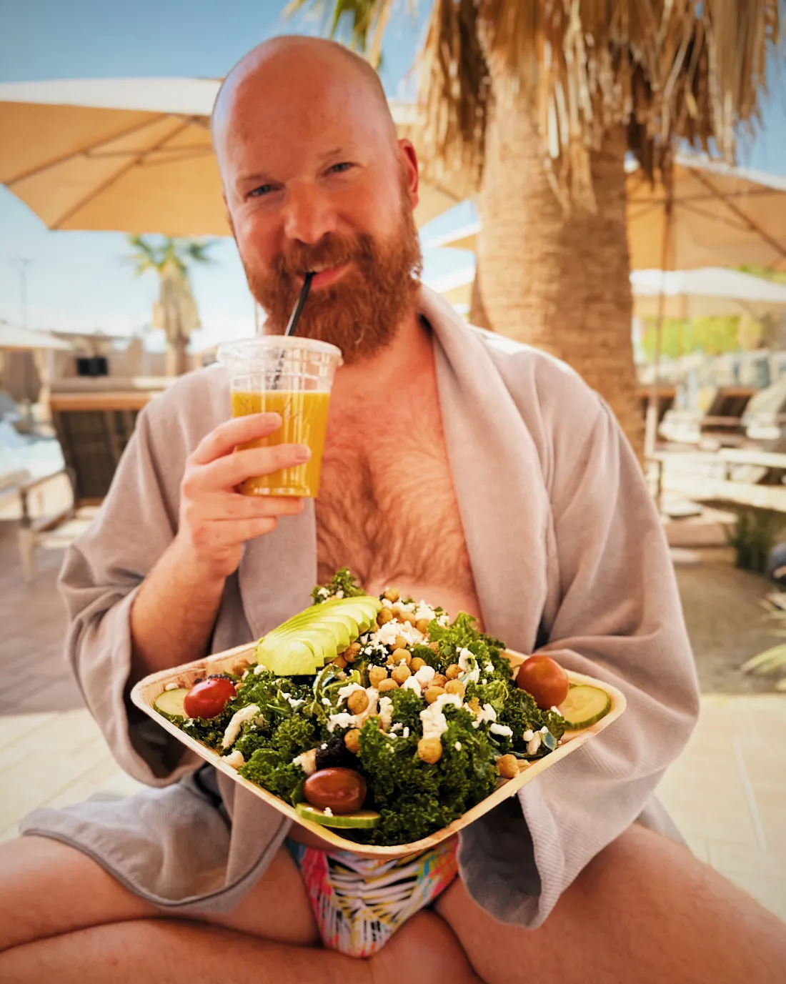 Daan having a healthy & delicious lunch right next to the outdoor pool at The Spa at Séc-he © Coupleofmen.com