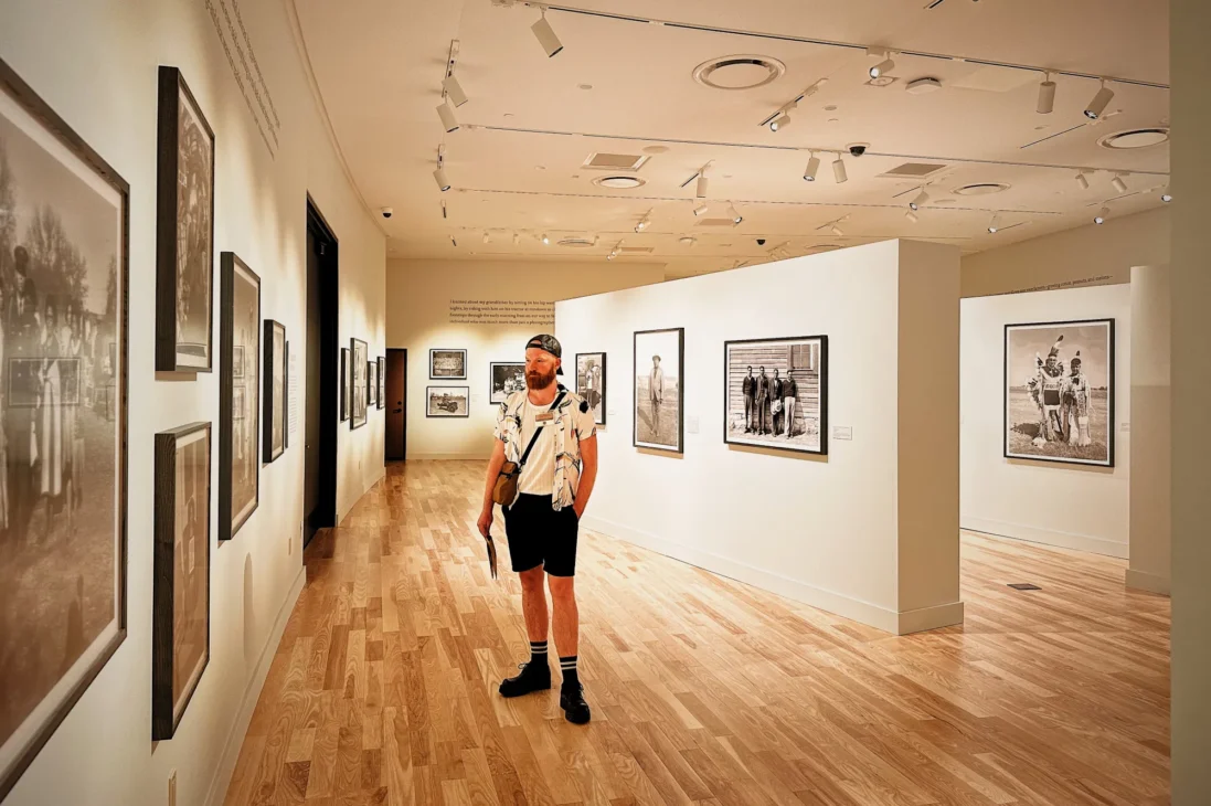 Daan fascinated by the photo exhibition at the Agua Caliente Cultural Museum © Coupleofmen.com