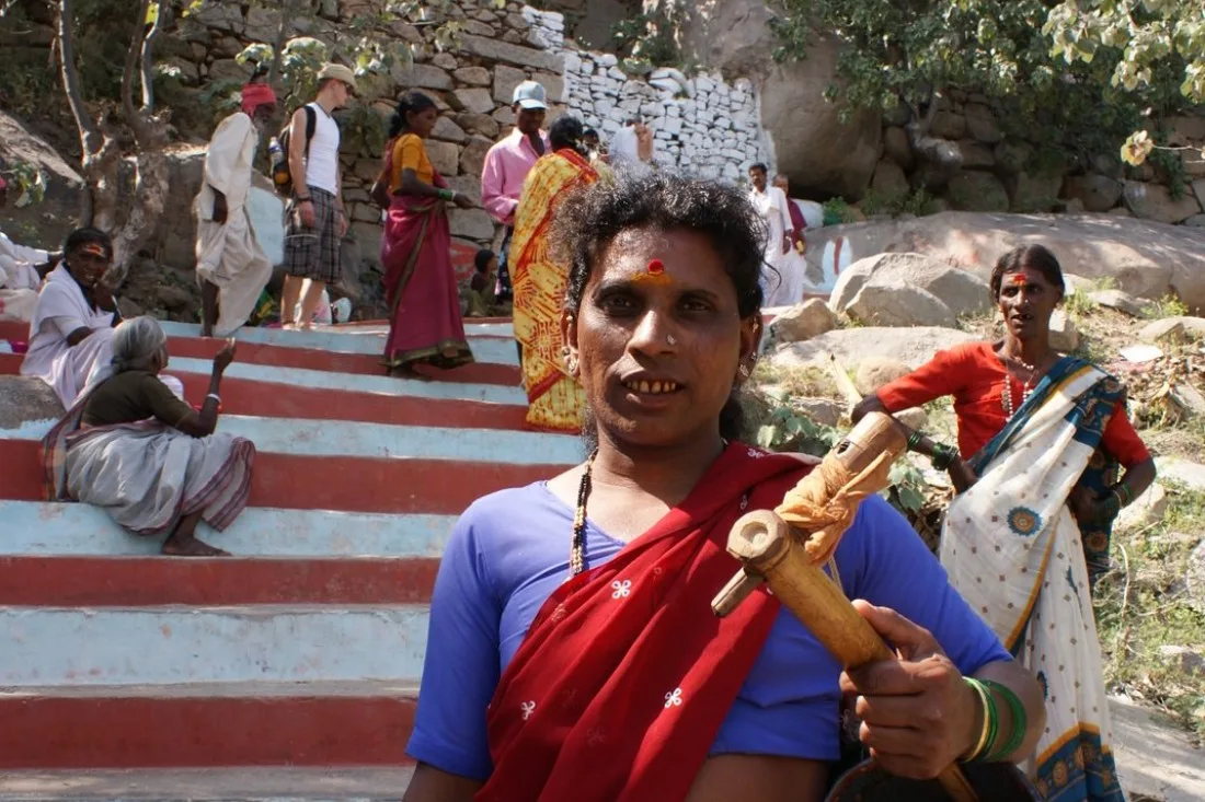 Portrait of a Hijra in Southern India with Karl in the background on the stairs © Coupleofmen.com LGBTQ+ Glossary