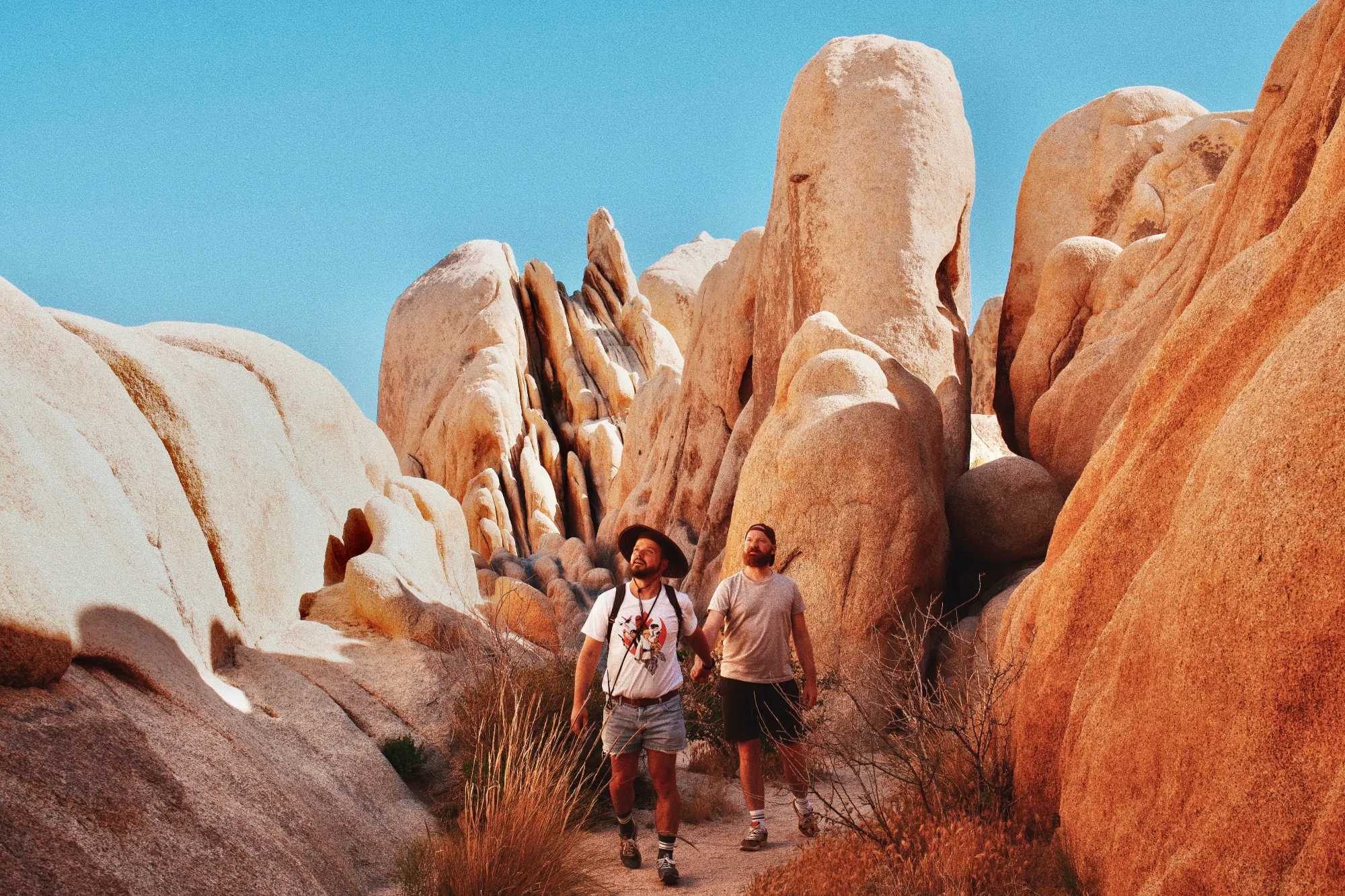 Exploring rock formations at Joshua Tree National Park © Coupleofmen.com
