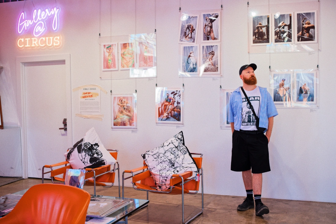 Daan enjoying queer art in a gallery in West Hollywood © Coupleofmen.com | West Hollywood LGBTQ+ travel guide