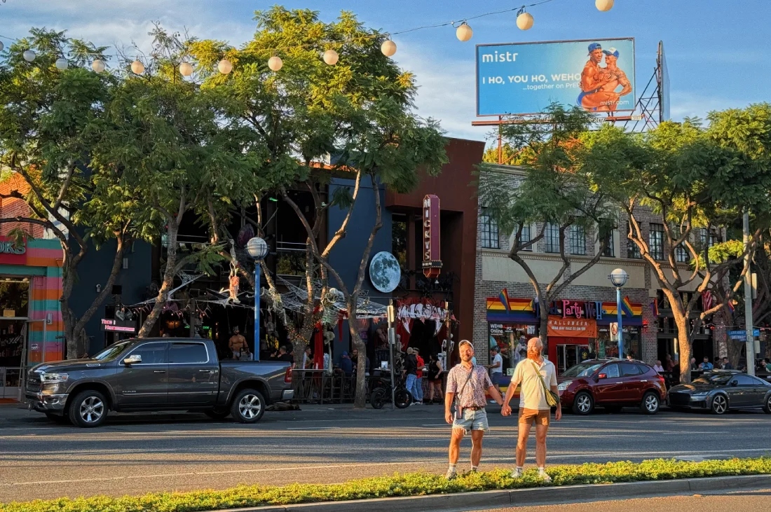 Exploring hand in hand Santa Monica Boulevard, bars, clubs, cafés, brunch spots, shops, and hotels © Coupleofmen.com | West Hollywood LGBTQ+ travel guide