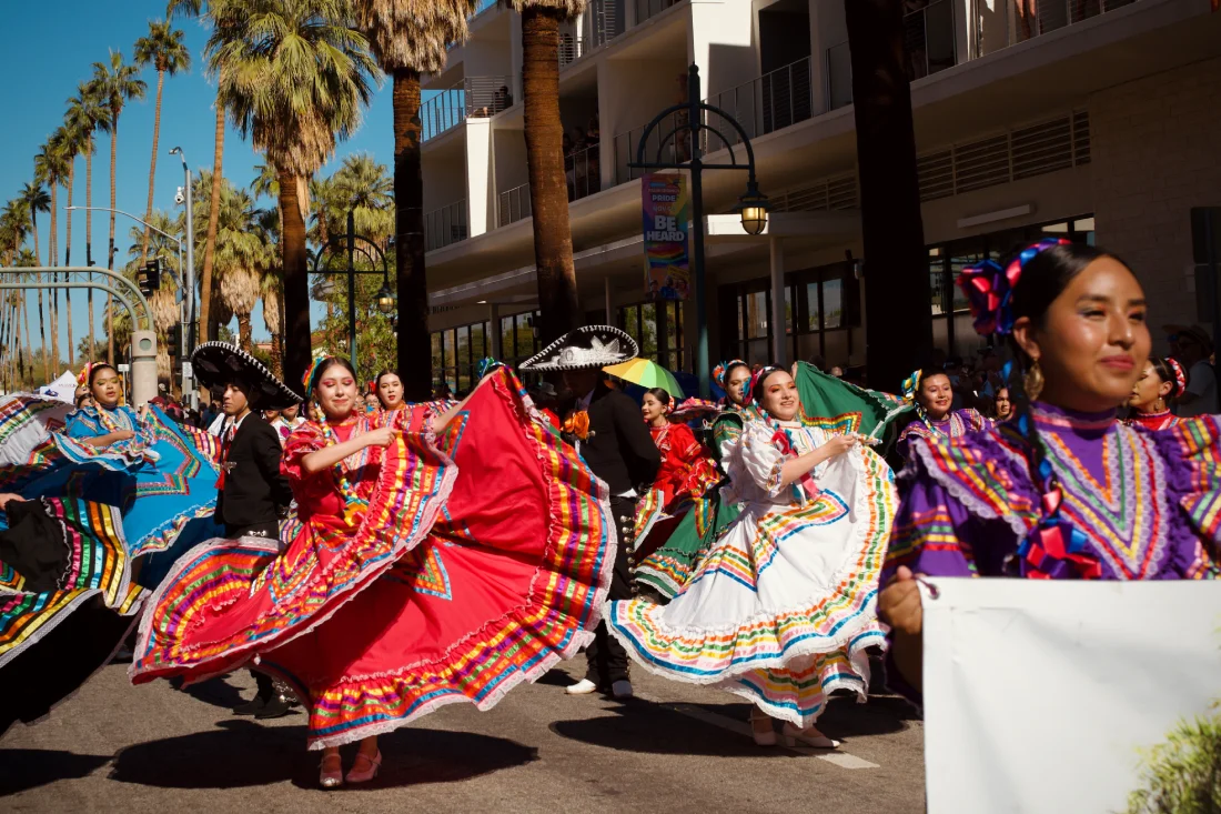 Colorful Pride Dancers from the Cathedral City High School Ballet Folklórico © Coupleofmen.com