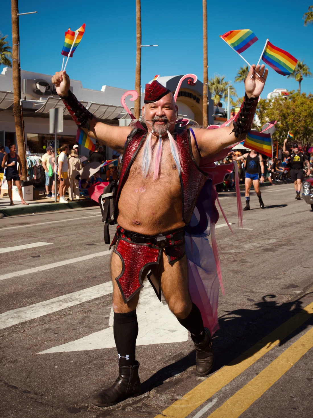 Gay locals walking Palm Springs Pride Parade © Coupleofmen.com