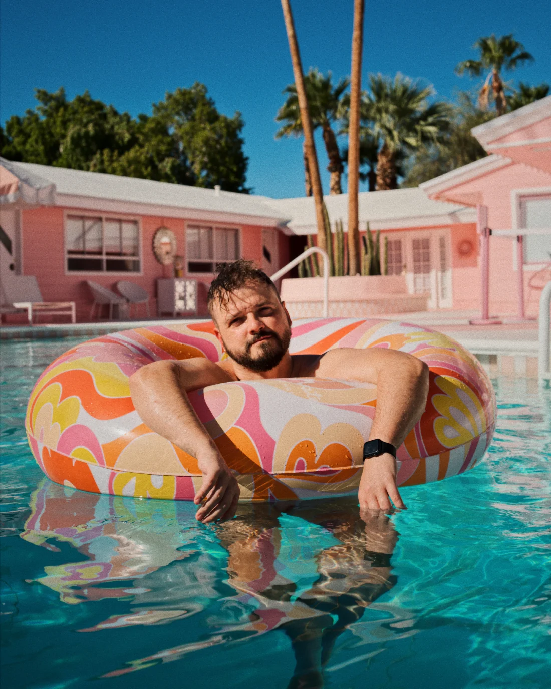 Gaycation at its best: Karl hanging around in the Trixie Motel pool &copy; Coupleofmen.com