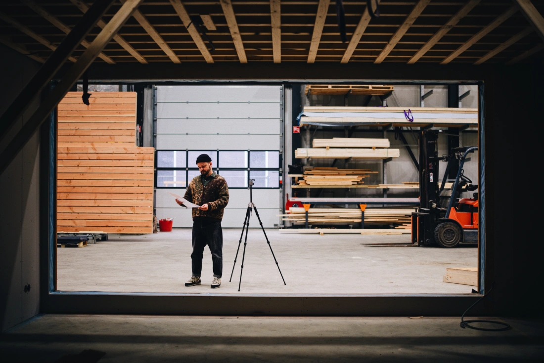 Karl checking the construction plans &copy; Coupleofmen.com Roof extension Amsterdam