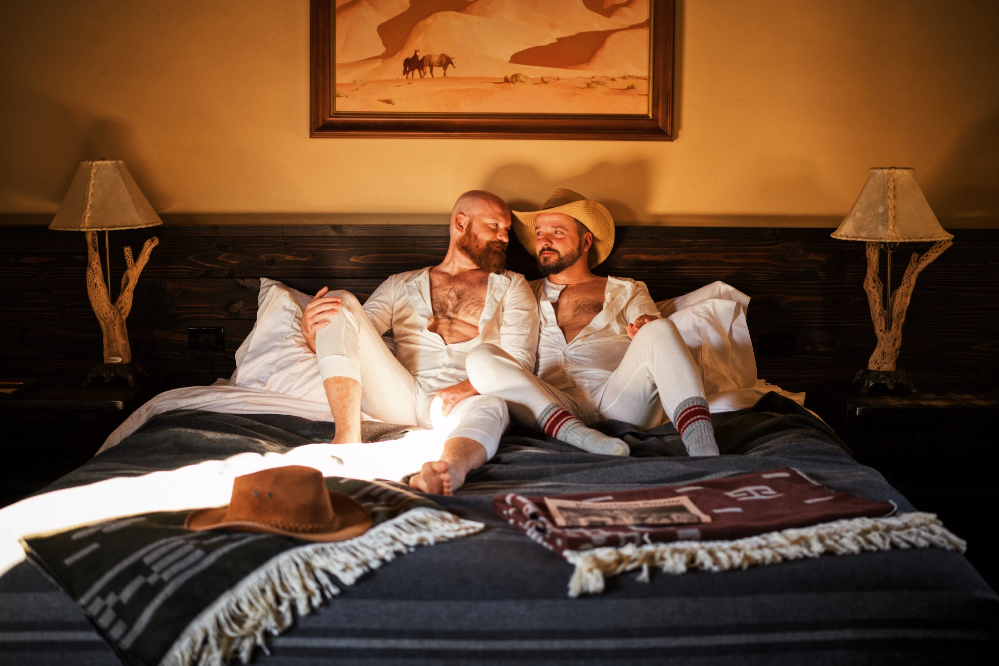 Our Gay Couple Stay at the Historic Pioneertown Motel in bed © Coupleofmen.com