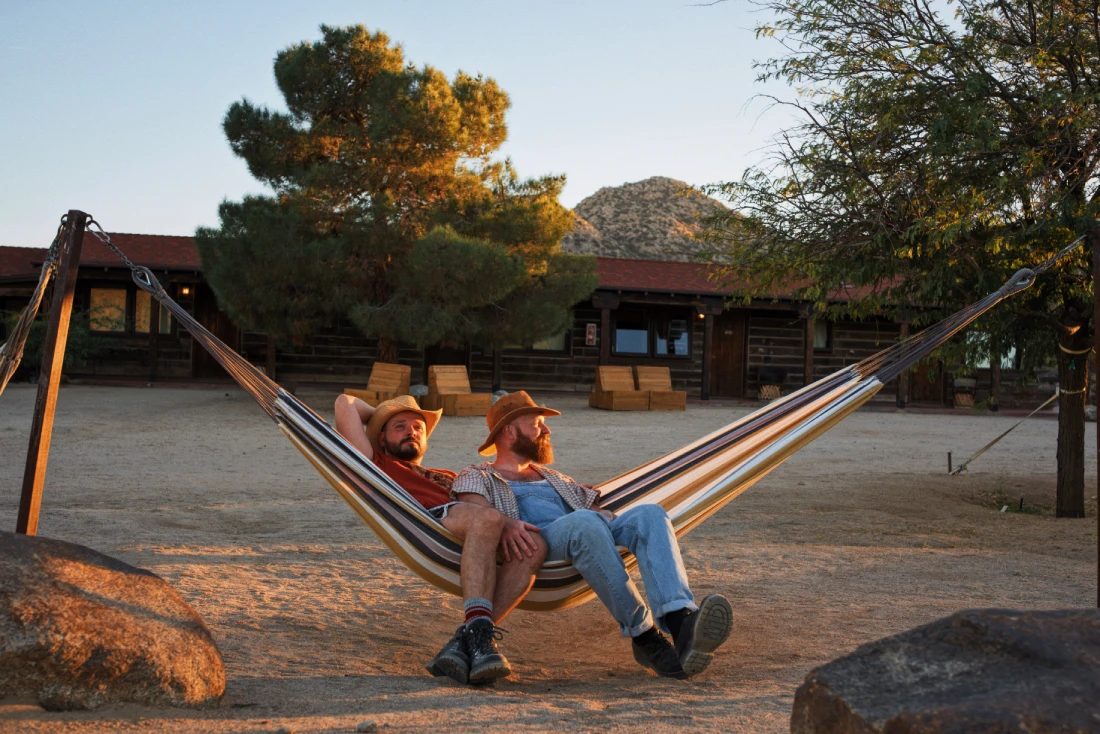 Hammocks placed in the garden area behind the rooms of the Pioneertown Motel © Coupleofmen.com