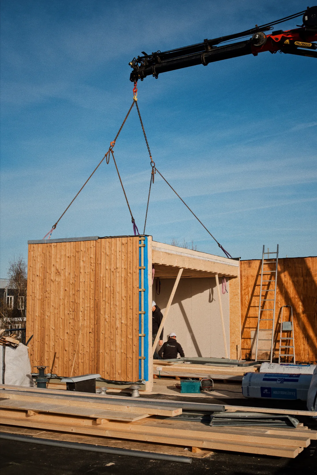 What the scariest moment of a prefab house delivery is? For us, the answer to the question, will it fit onto the roof? &copy;&nbsp;Coupleofmen.com