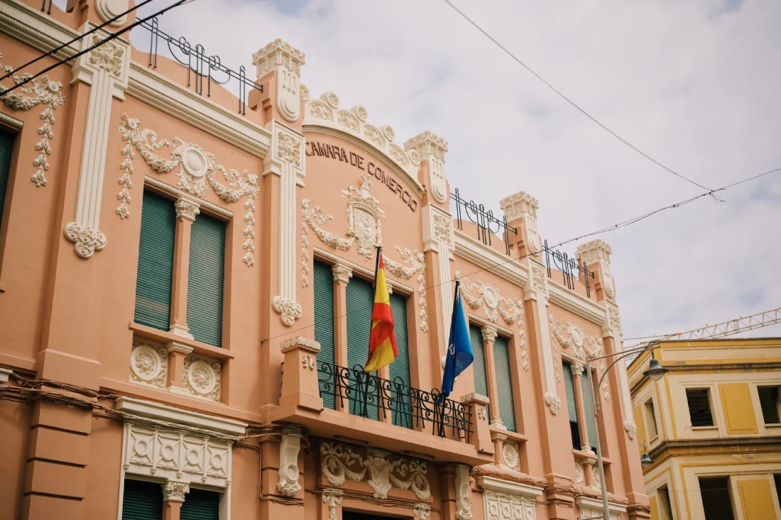 Beautiful facade of the building Camara de Comercio &copy; Coupleofmen.com