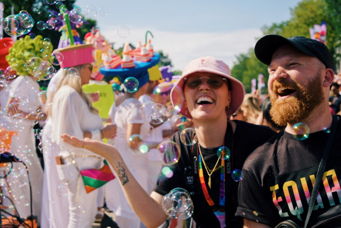 Celebrating Pride at the Canal Parade with friends &copy; Coupleofmen.com