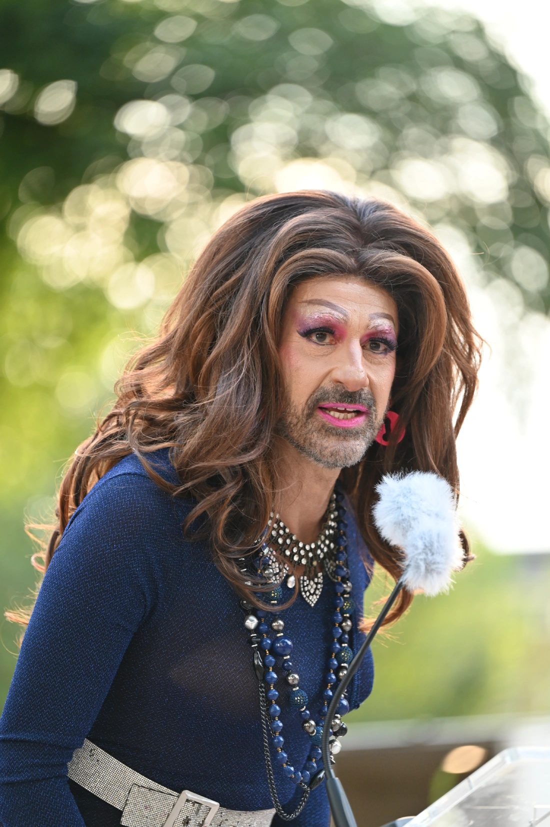 Drag icon Jennifer Hopelezz moderating the commemoration of the Berlin Pride Attack victims