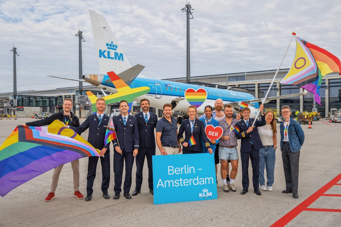 Group selfie at BER Airport with the crew in front of a KLM Cityhopper plane