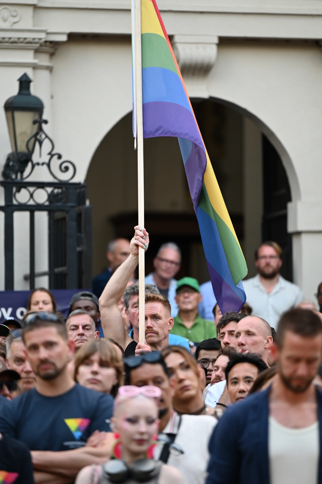 Holding up the rainbow flag up: Stronger together!