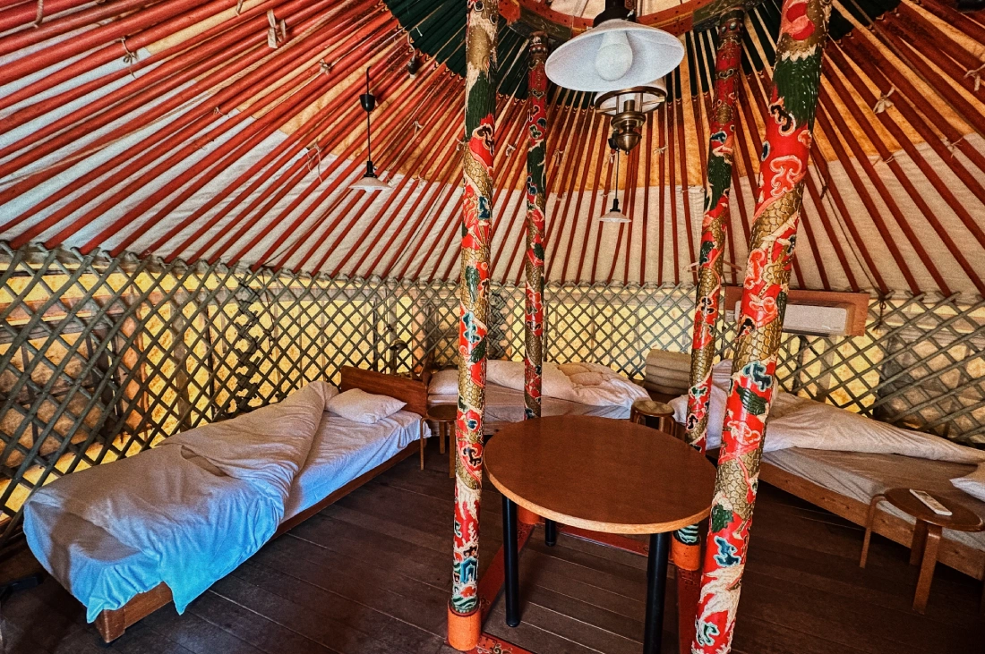 Inside the Yurt of 直島町ふるさと海の家 つつじ荘 -SeaSide Park Stay Tsutsujiso | Naoshima gay travel guide
