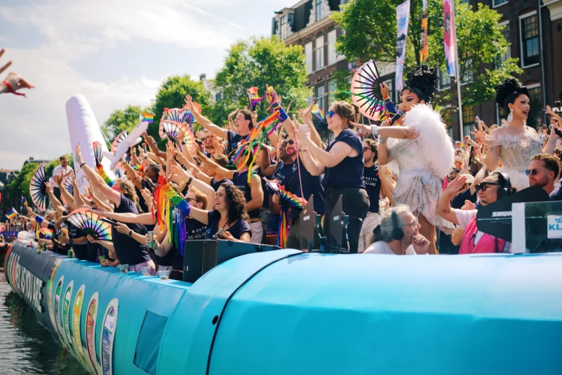 KLM and Delta Canal Parade Boat led by Drag Icon Miss Envy Peru &copy; Coupleofmen.com