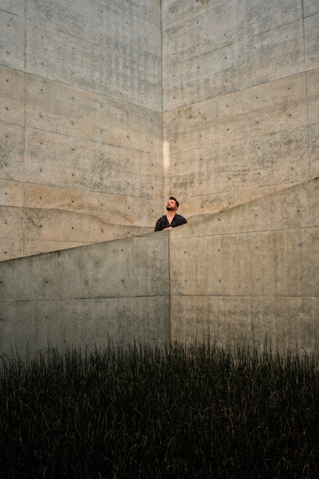 Karl enjoying the sunlight reflection at the Chichu Art Museum backyard