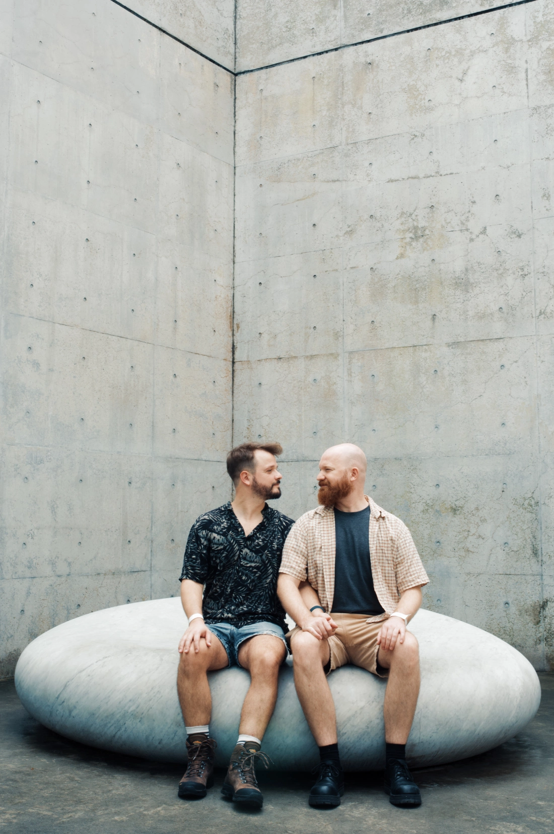 Photo of us sitting on Kan Yasuda's "Secret of the Sky" artwork | Naoshima gay travel guide