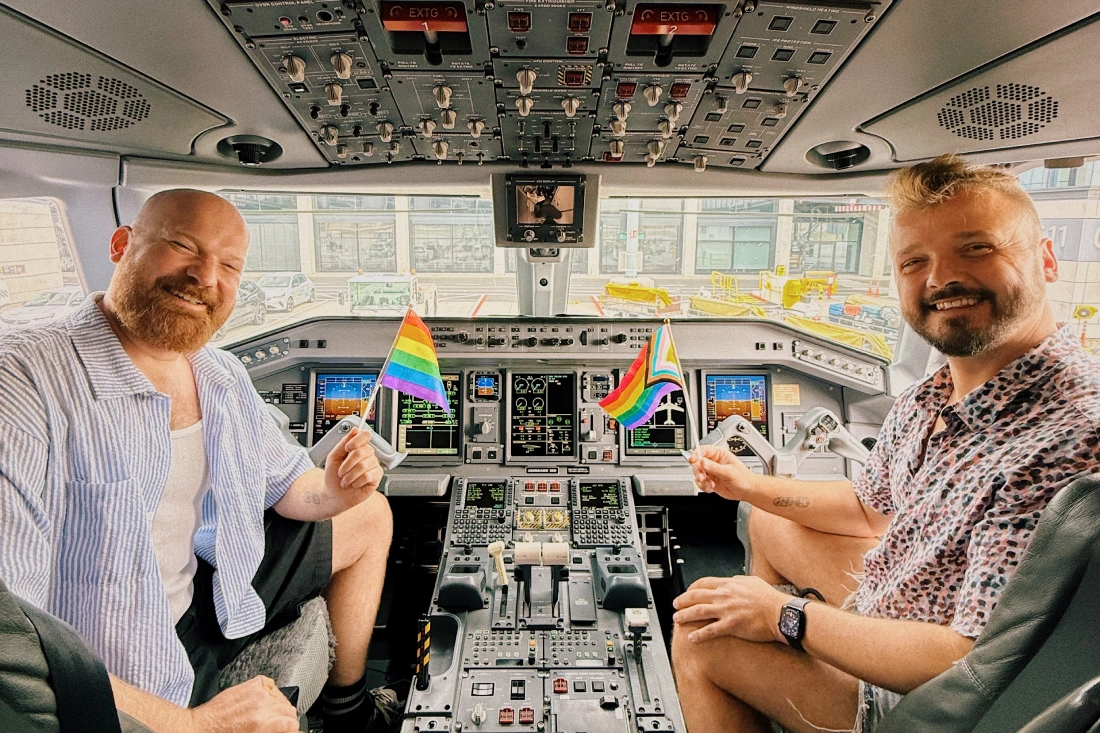 Waving the rainbow flag in a KLM Cityhopper flight in BER